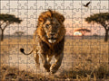 Fotopuzzel Leeuw 'Savanna Charge' | Liggend - Stukjes Geluk